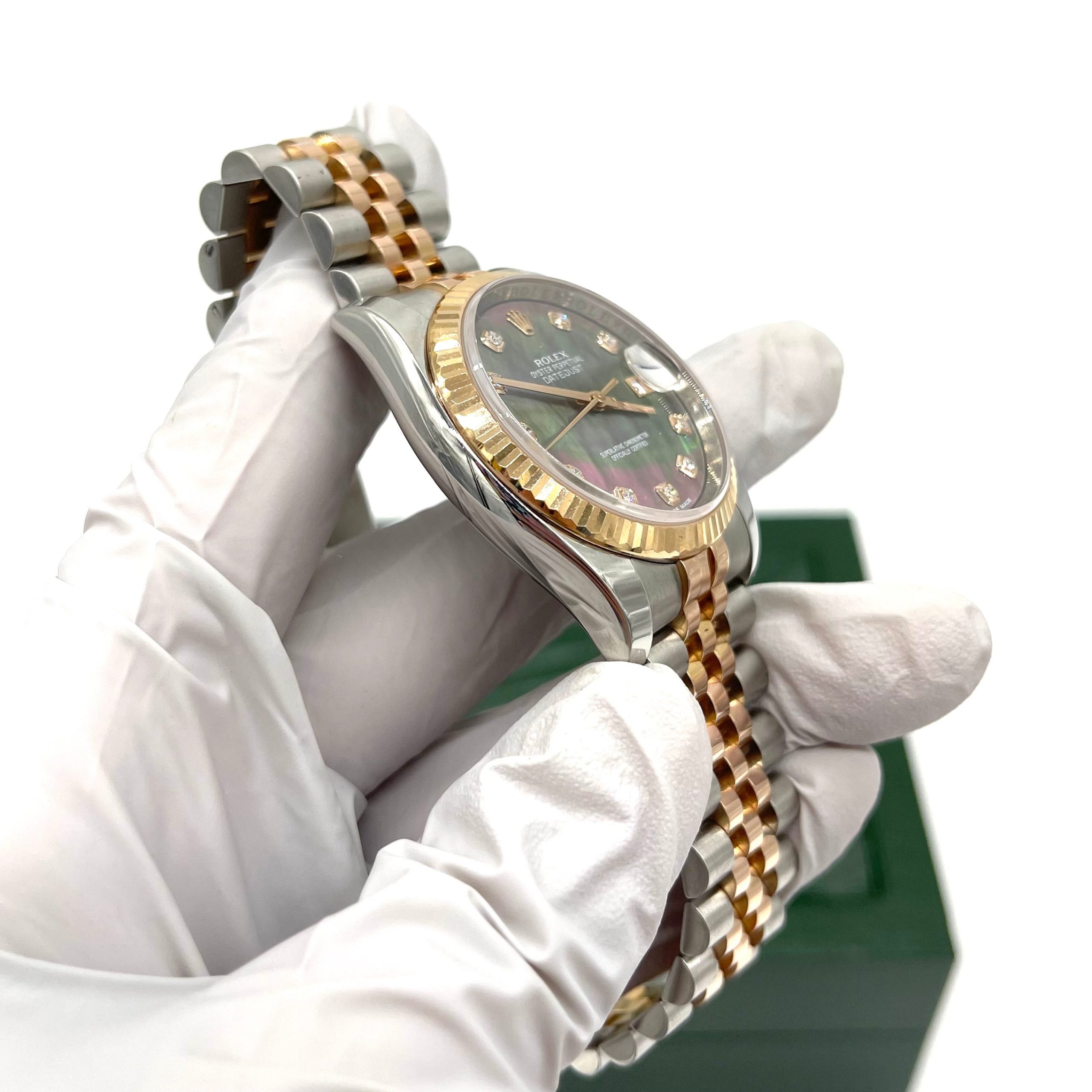 ROLEX Oyster Perpetual Datejust 36 Black Mother of Pearl Dial Stainless Steel and 18K Gold Jubilee Bracelet Automatic Watch Item No. 116231BKMDJ