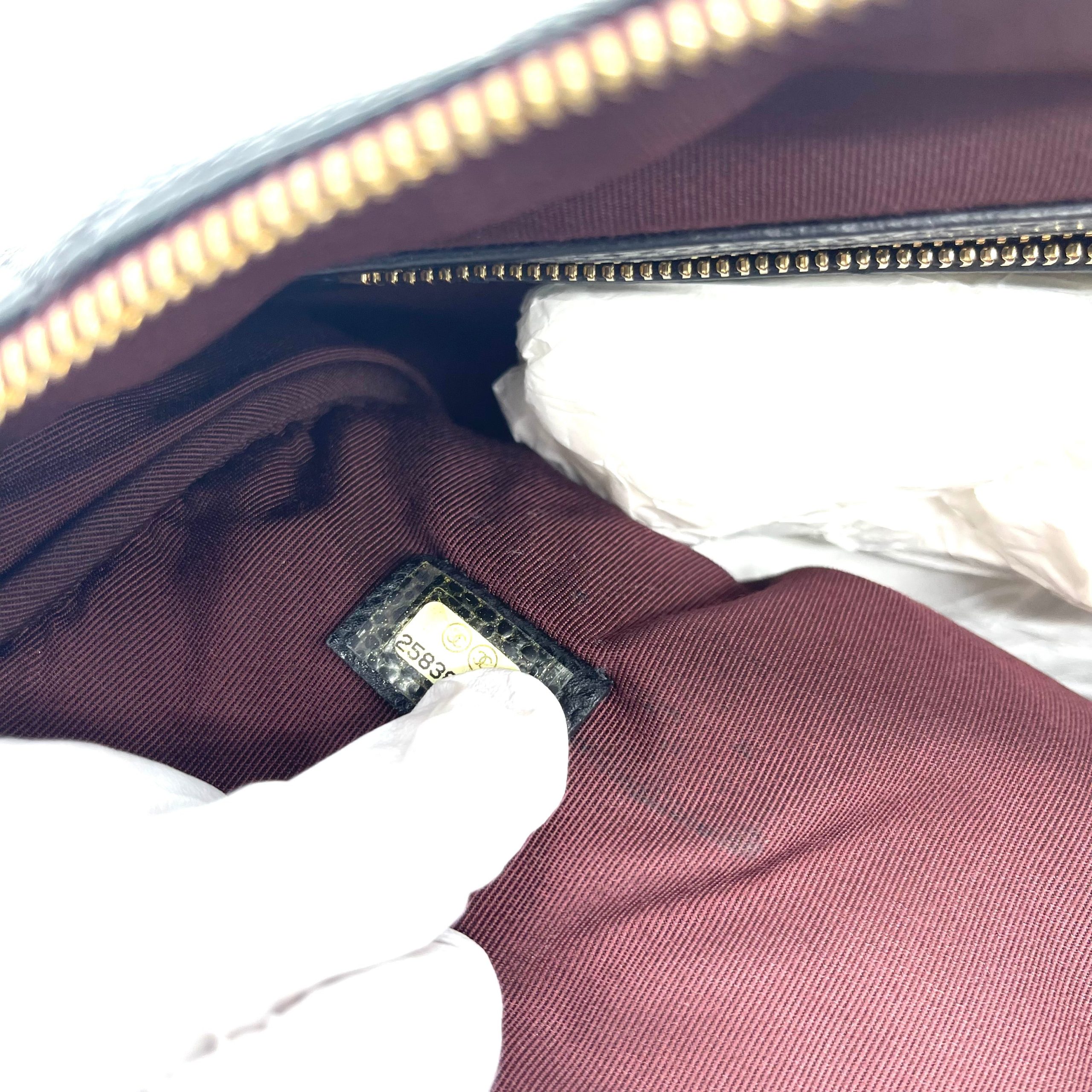 CHANEL O Case Large Clutch in Black Quilted Caviar Leather with Gold-Tone Hardware