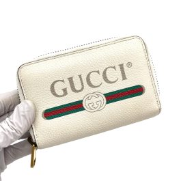 GUCCI
Calfskin Logo Zip Around Card Case White
