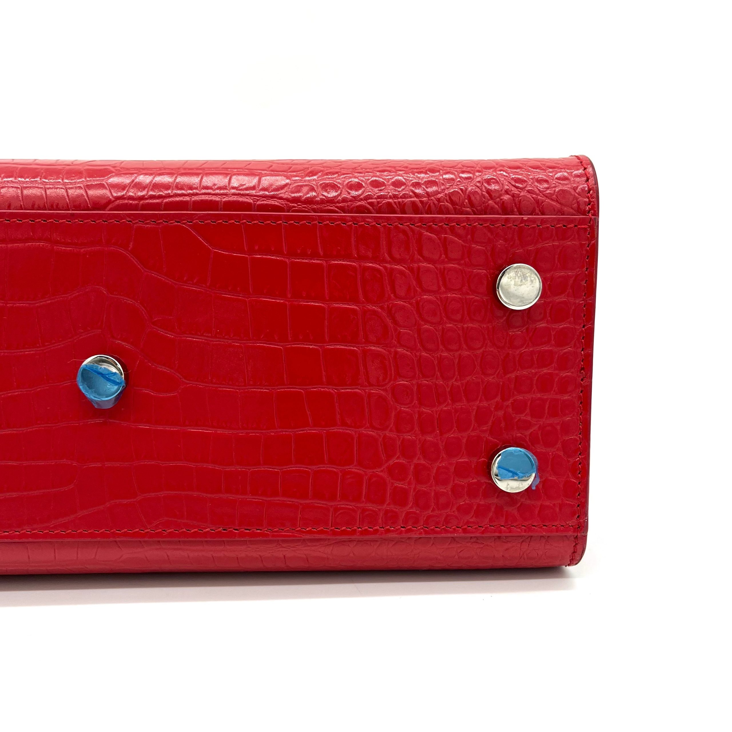 Saint Laurent small sac de jour top handle bag in matte embossed crocodile Leather Red